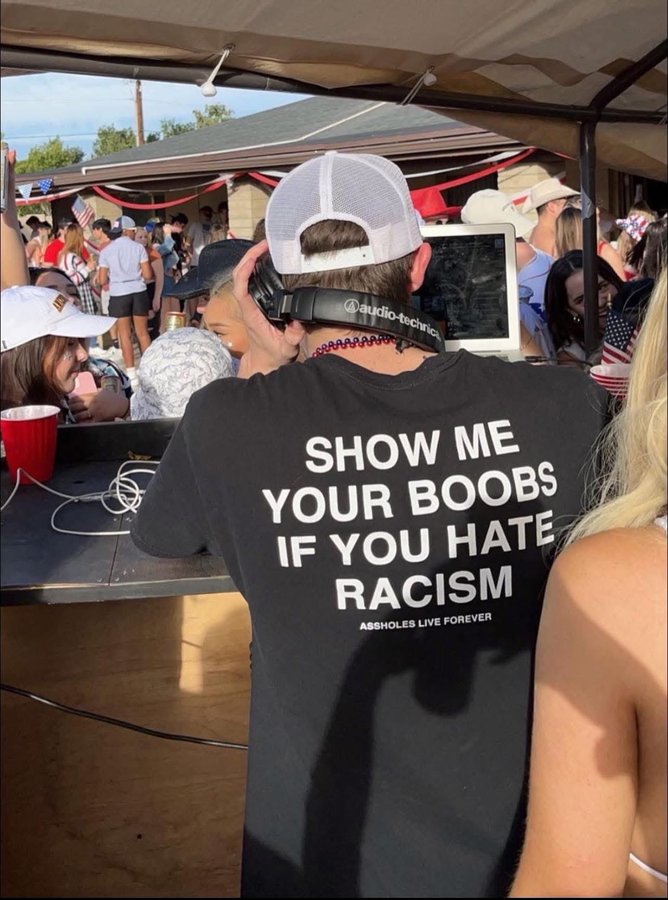 show me your boobs if you hate racism shirt meaning